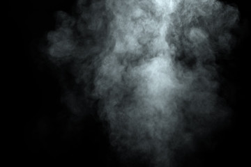 Abstract  powder or smoke isolated on black background