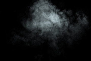 Abstract  powder or smoke isolated on black background