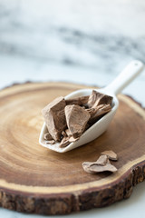 Chocolate Shavings. Raw cacao mass