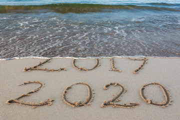 New Year 2020 is coming concept. Happy New Year 2020 replace 2019 concept on the sea beach