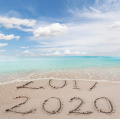 New Year 2020 is coming concept. Happy New Year 2020 replace 2019 concept on the sea beach