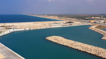 Aerial Image over Harbor Under Construction in Israel Drone view over Ashdod New port under Construction with coastline in the background, Israel