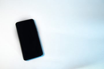 Smartphone with black screen on white background