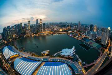 Fototapeta na wymiar Aerial view of Singapore skyline and Marina Bay at sunset