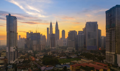 Fototapeta na wymiar Beautiful scenery of Kuala Lumpur City Centre with sunrise sky background