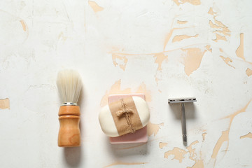Fototapeta na wymiar Set for male shaving on light background