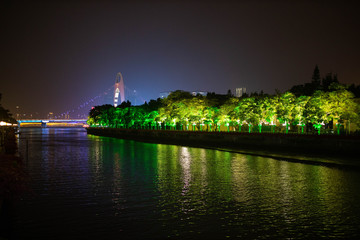Night Of Guangzhou. The Pearl river with bridge. Zhujiang New Town