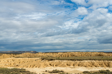 Eroded hills and canyons in the white ground of the Spanish semi-desert Bardenas Reales