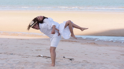 A happy couple on the beach