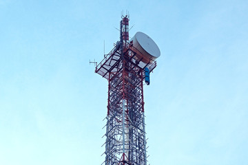 Station of mobile communication against a blue sky. tv tower