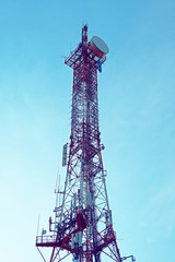 Station of mobile communication against a blue sky. tv tower