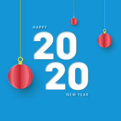 White text 2020 Happy New Year and hanging origami paper baubles decorated on blue background.