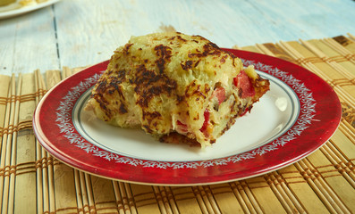 Potato pancakes dranik and chicken fillet roll