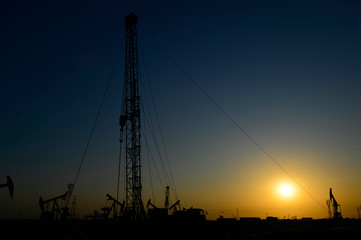 Fototapeta premium The oil workers in the job