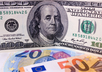 Euro and US dollars close up