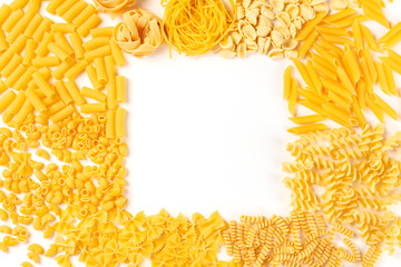 Italian pasta forming a square frame on a white background, shot from the top, a flat lay banner with copy space, a design template with a place for text