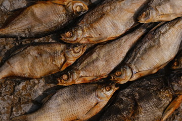conceptual flat background of dried fish. vobla