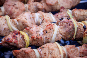 Meat skewers with onions on skewers. Charcoal meat.