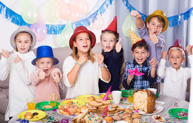 Cheerful children having party friend’s birthday