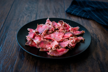 Turkish Bacon Pastirma / Pastrami Slices in Black Plate. Ready to Eat and Serve from Kastamonu and Kayseri.