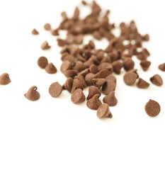 Semi Sweet Chocolate Chips isolated on white background close up. Selective focus.Top view. Copy space