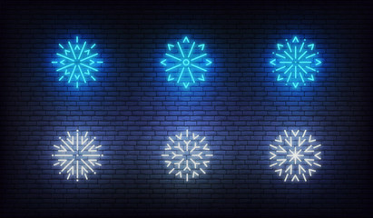 Snow neon icons. Vector glowing neon blue snowflake icons