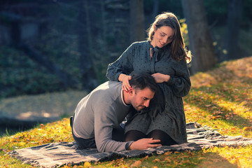 Husband listening for heartbeat of his unborn baby