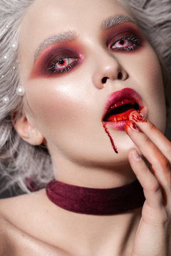 Halloween makeup style. Blood queen. Bride of Dracula image.