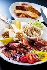 Breakfast table. Fresh salad with ham and toast. Healthy meal conception.