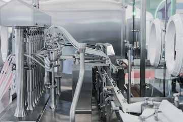 Automatic machine for filling ampoules and vials. Modern pharmaceutical equipment.