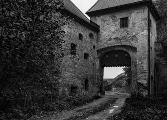 Fototapeta na wymiar gloomy archway in a castle