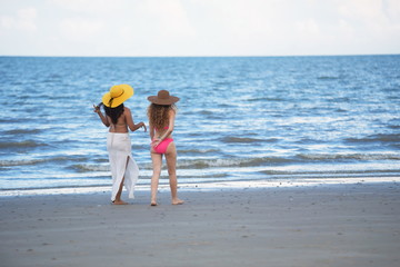 parent and child on beach