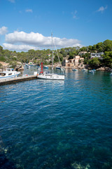 Cala Figuera Majorca, view of this natural port and traditional village which retains an atmosphere of a working fishing port. Clear water on a warm and sunny day.