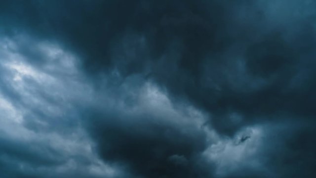 The dark blue sky and fine clouds are about to storm.