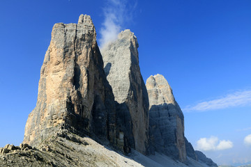 Fototapeta premium The three peaks of Lavaredo, also called the Drei Zinnen, are three distinctive battlement-like peaks, in the Sexten Dolomites of northeastern Italy. They are probably one of the best-known mountain 