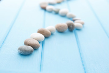 Row pebbles. Sea stones.