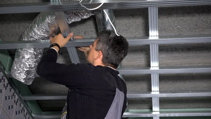 man mount ceiling profiles. Ventilation tube duct hidden under ceiling