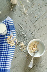 Milk and outs on concrete background