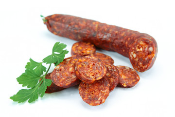 chorizo sliced on a white background