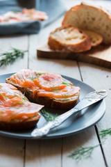 Sandwithes with smoked salmon and creamy cheese on bread