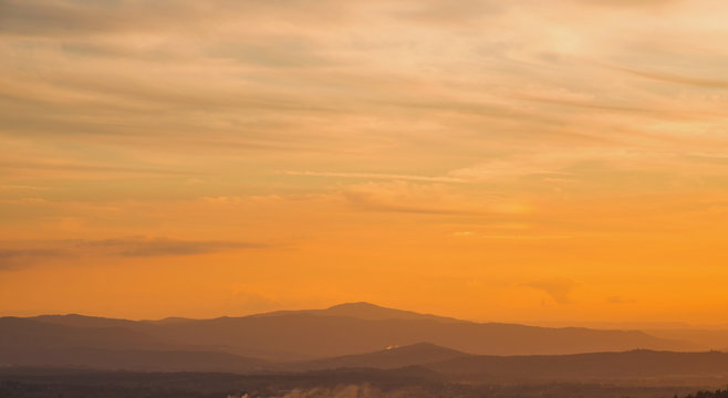 Beautiful sunset sky over Umbria countryside seen from the city of Perugia © crisfotolux