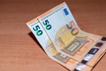 Business concept.2 Fifty euro banknotes. European money . Money as background.Close up.