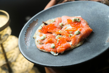 Flatbread with smoked salmon and red caviar