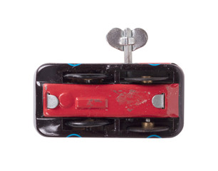 Vintage red wind-up toy car