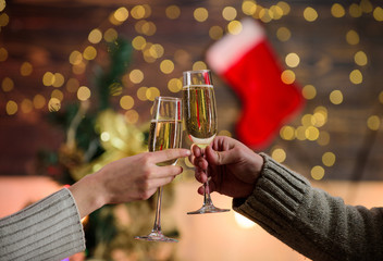 cheers. xmas party celebration. love spend time together. man toast champagne woman. family weekend. loving each other. couple in love. merry christmas. happy new year. winter holiday