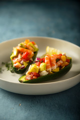 Shrimp salad served in avocado