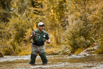 Man fishing a river