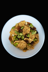 Variety of cold cereals in white bowls, quick breakfast for kids overhead shot with copyspace