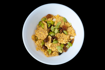 Variety of cold cereals in white bowls, quick breakfast for kids overhead shot with copyspace