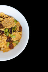 Variety of cold cereals in white bowls, quick breakfast for kids overhead shot with copyspace